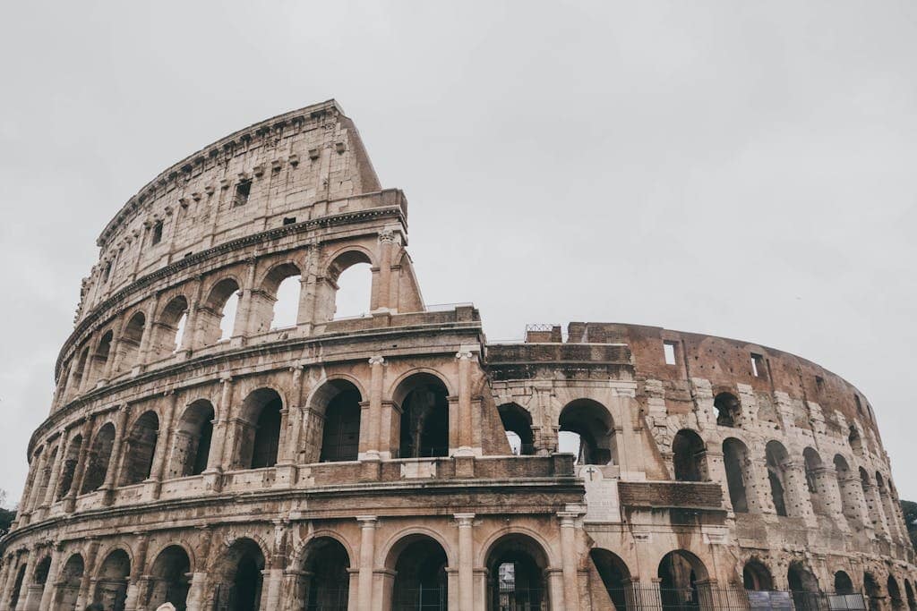 Discover the grandeur of the iconic Colosseum, Rome’s ancient landmark and famed historical site.